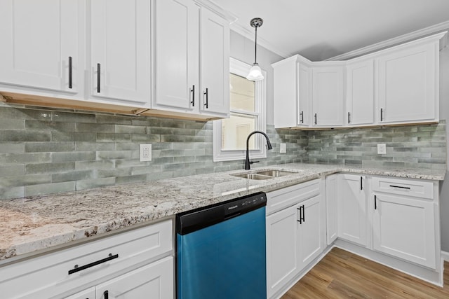 4848 Lori St, Valdosta, GA 31605 - kitchen with dishwasher, a sink, white cabinets, light wood finished floors, and light stone countertops