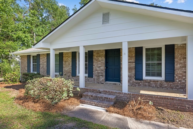 4848 Lori St, Valdosta, GA 31605 - view of front of home featuring covered porch and brick siding