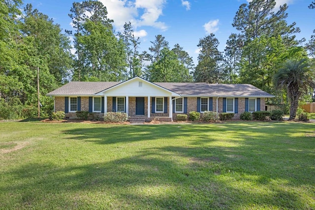 4848 Lori St, Valdosta, GA 31605 - ranch-style home with brick siding and a front yard