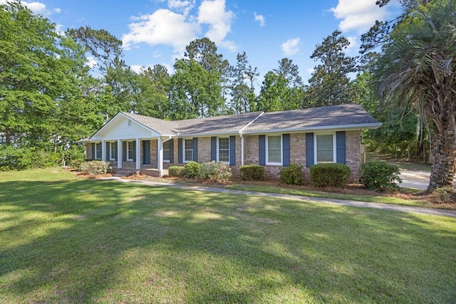 4848 Lori St, Valdosta, GA 31605 - ranch-style house with brick siding and a front yard