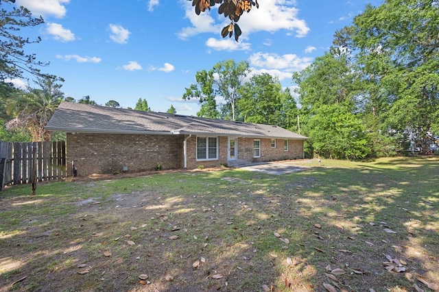 4848 Lori St, Valdosta, GA 31605 - back of property featuring a patio and brick siding