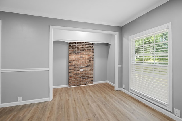 4848 Lori St, Valdosta, GA 31605 - spare room with wood finished floors, baseboards, and crown molding