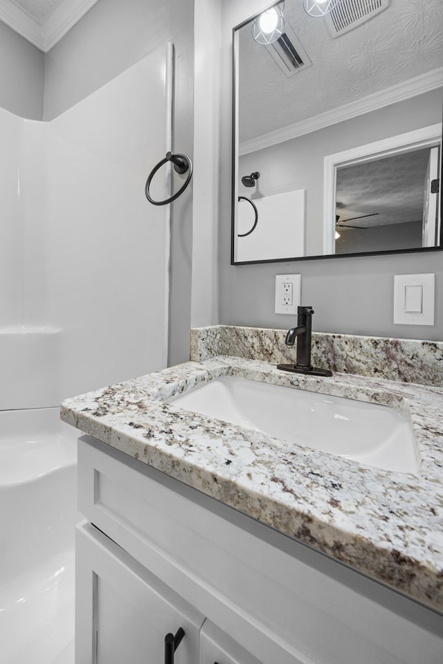 4848 Lori St, Valdosta, GA 31605 - bathroom with vanity, crown molding, and ceiling fan