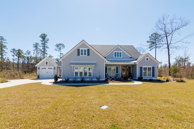 craftsman-style home with a garage, metal roof, a standing seam roof, a front lawn, and board and batten siding