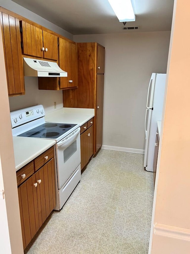 kitchen featuring white appliances