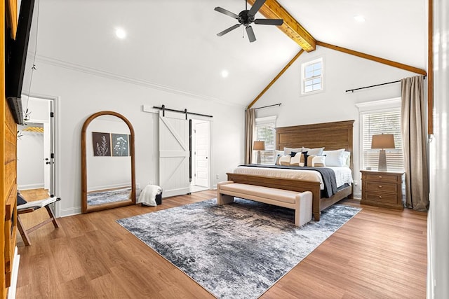 bedroom with wood finished floors, a barn door, high vaulted ceiling, recessed lighting, and beamed ceiling