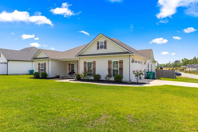 view of front of house with concrete driveway, a garage, a front lawn, and fence