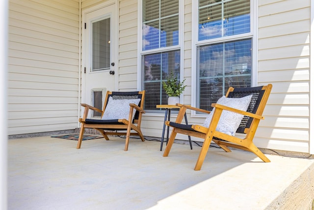 view of patio featuring a porch