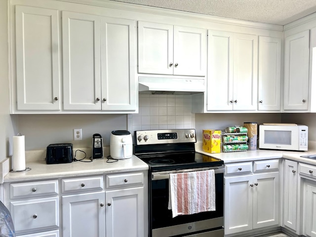 kitchen featuring electric stove, white cabinets, and under cabinet range hood