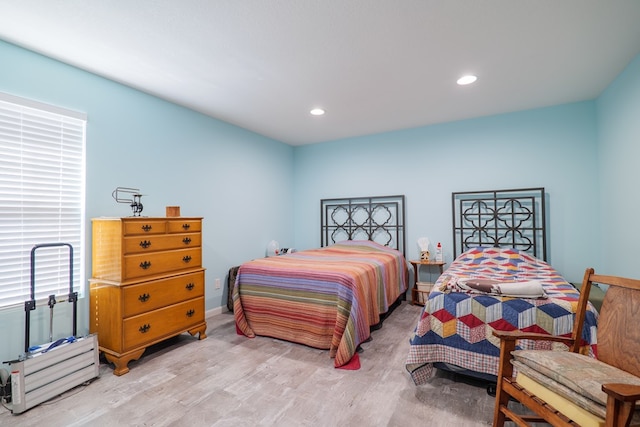 bedroom featuring light hardwood / wood-style floors