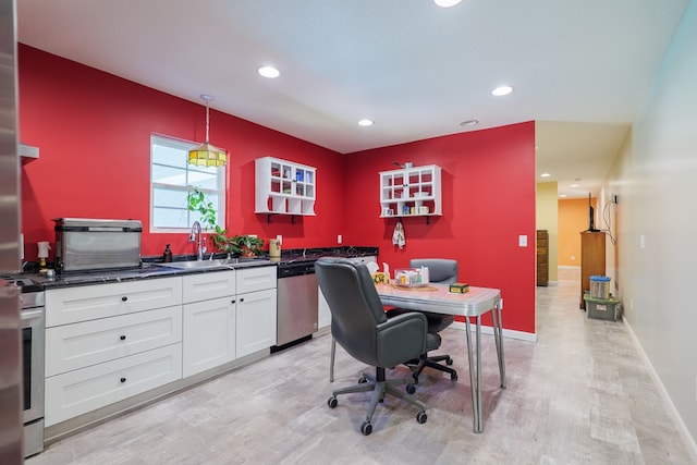 office area with sink and light hardwood / wood-style floors