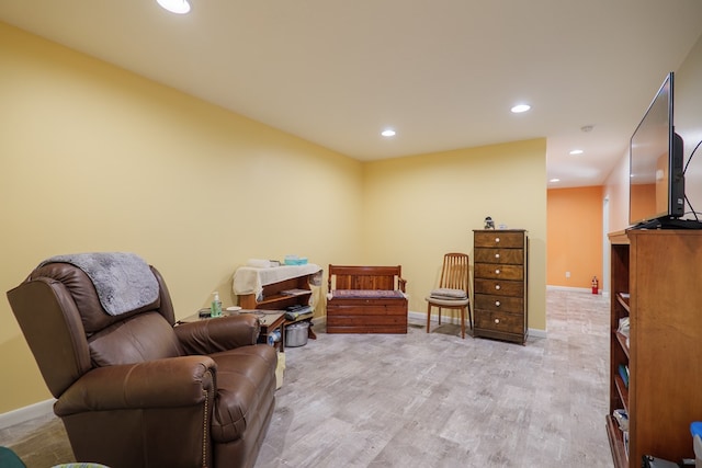 sitting room with light wood-type flooring