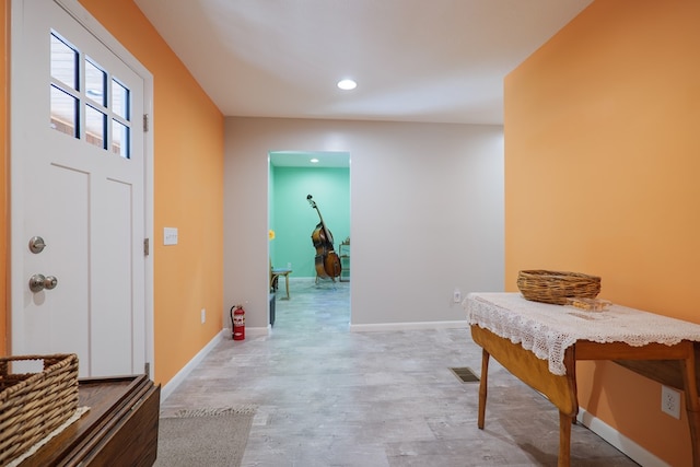 entrance foyer with light hardwood / wood-style floors