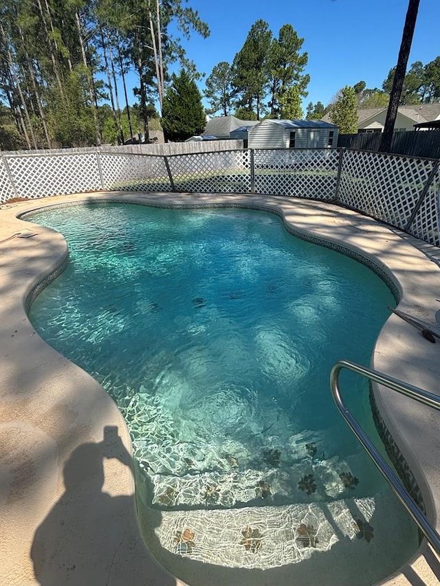717 E 44th St, Tifton, GA 37194 - view of swimming pool with a fenced backyard