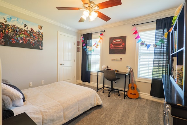 carpeted bedroom featuring multiple windows, a ceiling fan, crown molding, and baseboards