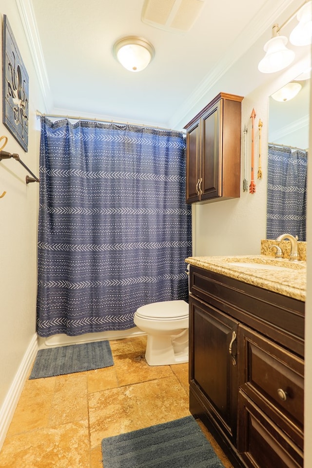 full bath with vanity, baseboards, visible vents, crown molding, and toilet