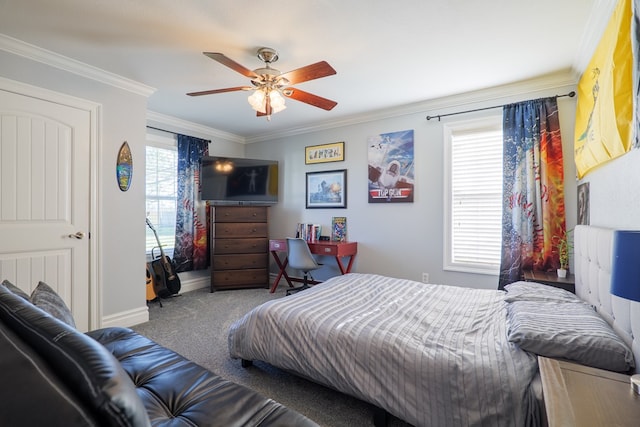 bedroom with carpet flooring, a ceiling fan, baseboards, and ornamental molding