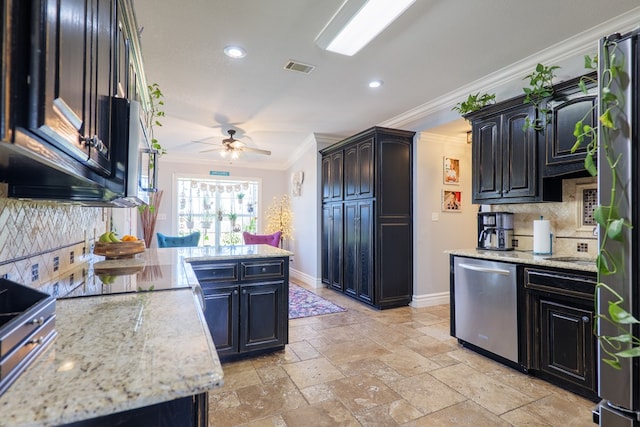 kitchen with visible vents, ornamental molding, stone tile flooring, stainless steel appliances, and a peninsula