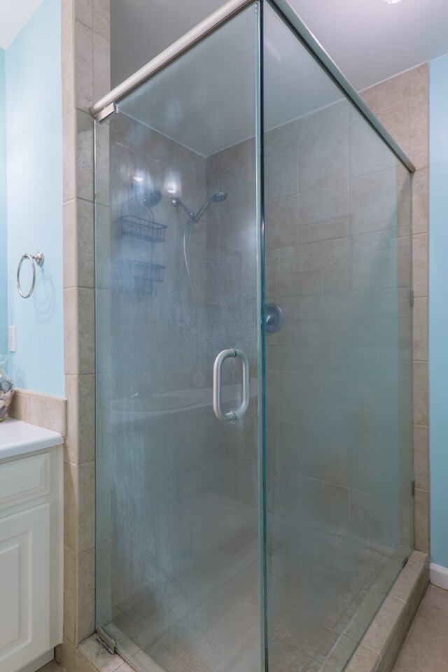 4600 Rustic Ridge Rd, Valdosta, GA 31602 - full bathroom featuring vanity and a shower stall
