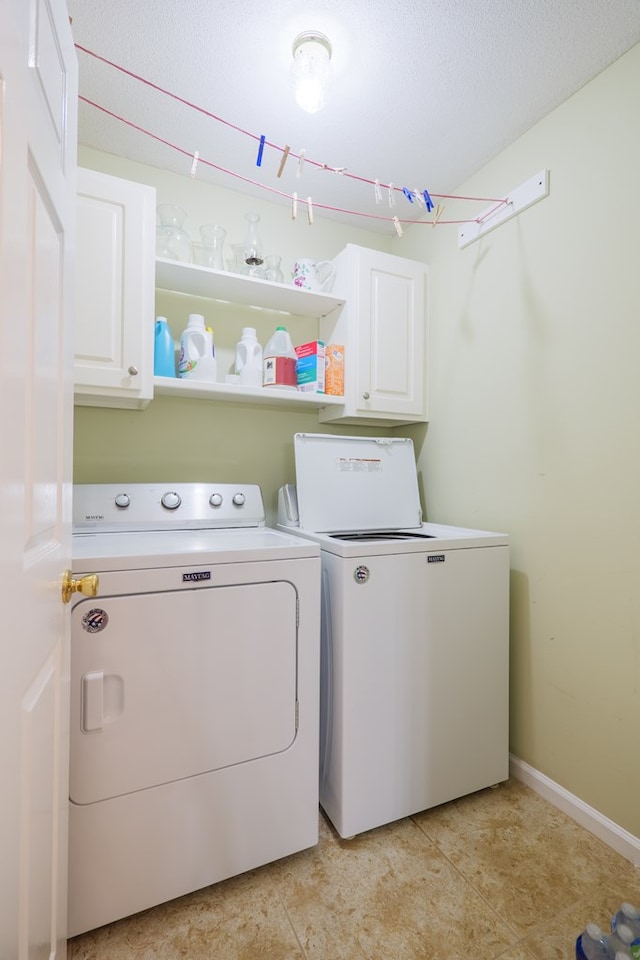 4600 Rustic Ridge Rd, Valdosta, GA 31602 - washroom with cabinet space and washing machine and clothes dryer