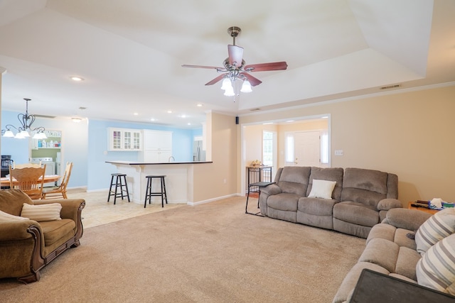4600 Rustic Ridge Rd, Valdosta, GA 31602 - living area with light carpet, a ceiling fan, recessed lighting, a chandelier, and light tile patterned flooring
