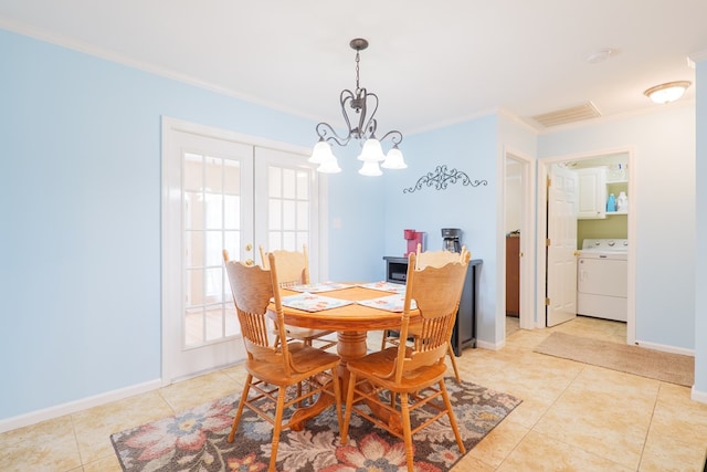 4600 Rustic Ridge Rd, Valdosta, GA 31602 - dining space with washer / dryer, crown molding, light tile patterned floors, french doors, and a chandelier