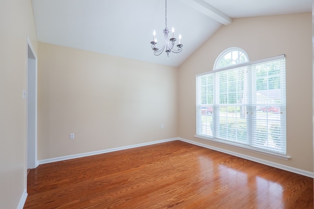 4600 Rustic Ridge Rd, Valdosta, GA 31602 - spare room featuring beamed ceiling, a chandelier, wood finished floors, and high vaulted ceiling