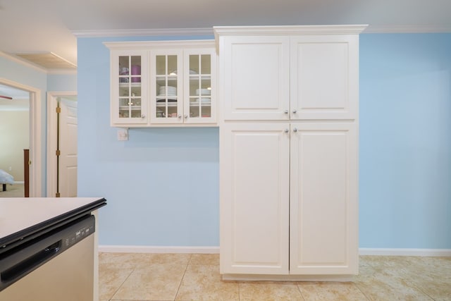 4600 Rustic Ridge Rd, Valdosta, GA 31602 - kitchen with dishwasher, glass insert cabinets, crown molding, white cabinetry, and light tile patterned floors