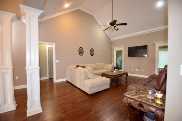 living room featuring decorative columns, ceiling fan, and dark hardwood / wood-style floors