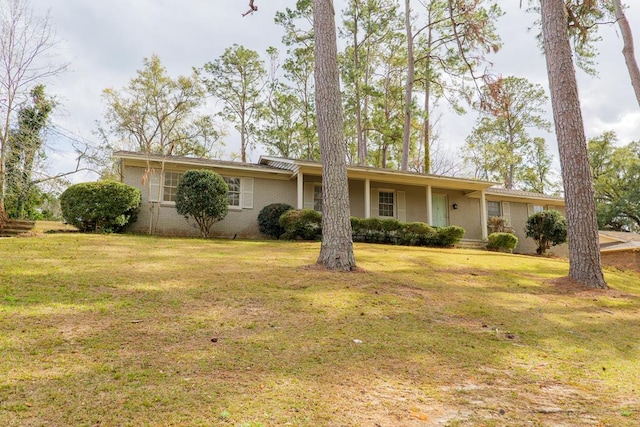 2205 Briarcliff Dr, Valdosta, GA 31602 - ranch-style house with brick siding and a front lawn