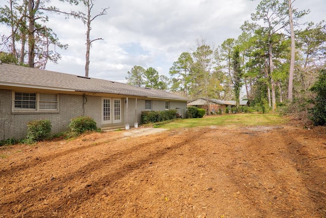 2205 Briarcliff Dr, Valdosta, GA 31602 - view of yard featuring french doors
