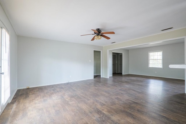 2205 Briarcliff Dr, Valdosta, GA 31602 - empty room featuring dark wood-style floors, visible vents, baseboards, and a ceiling fan