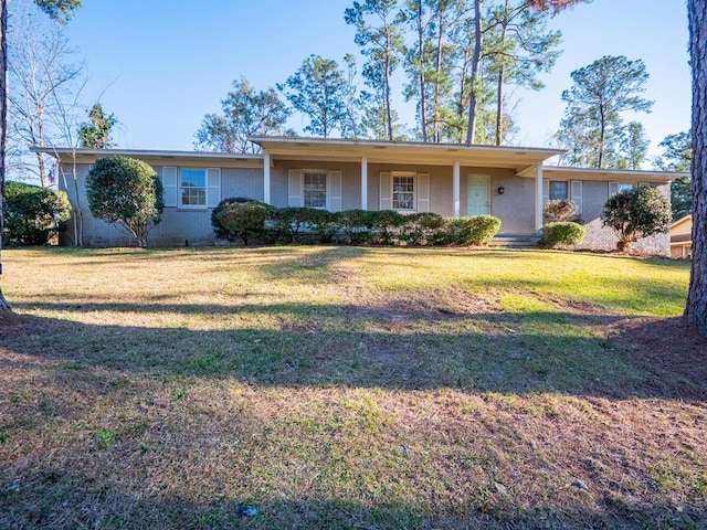 ranch-style house with a front yard