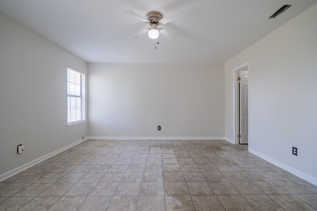 empty room featuring ceiling fan