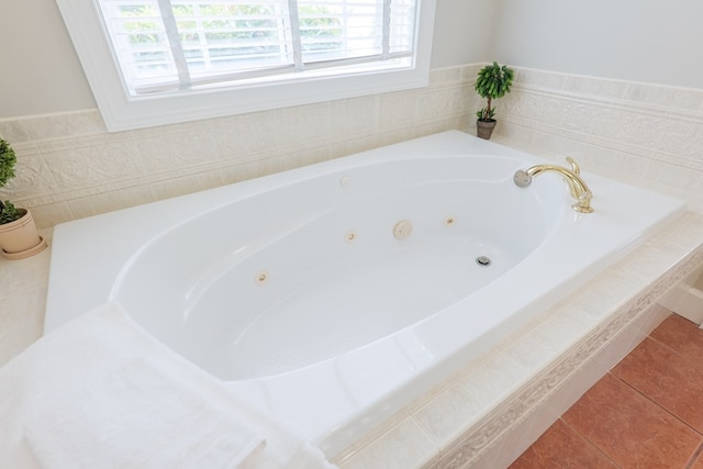 3532 Victoria Dr, Valdosta, GA 31602 - bathroom featuring a whirlpool tub and tile patterned floors