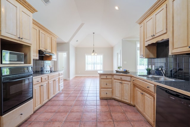 3532 Victoria Dr, Valdosta, GA 31602 - kitchen with black appliances, light brown cabinetry, under cabinet range hood, lofted ceiling, and tasteful backsplash