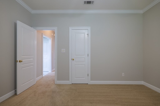 3532 Victoria Dr, Valdosta, GA 31602 - spare room featuring ornamental molding and light colored carpet