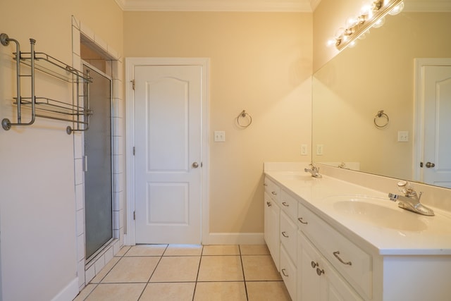 bathroom featuring tile patterned floors, vanity, ornamental molding, and walk in shower