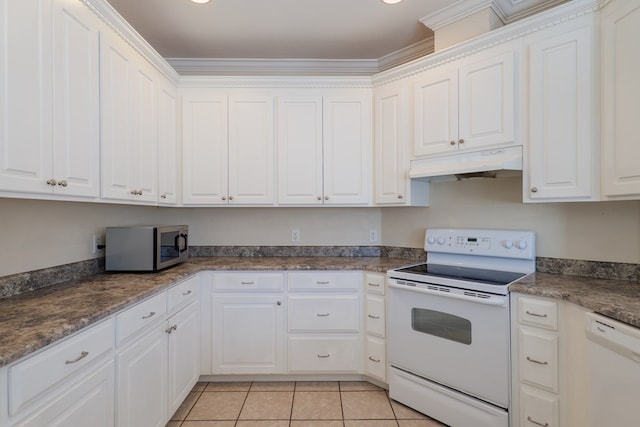 kitchen with white appliances and white cabinetry