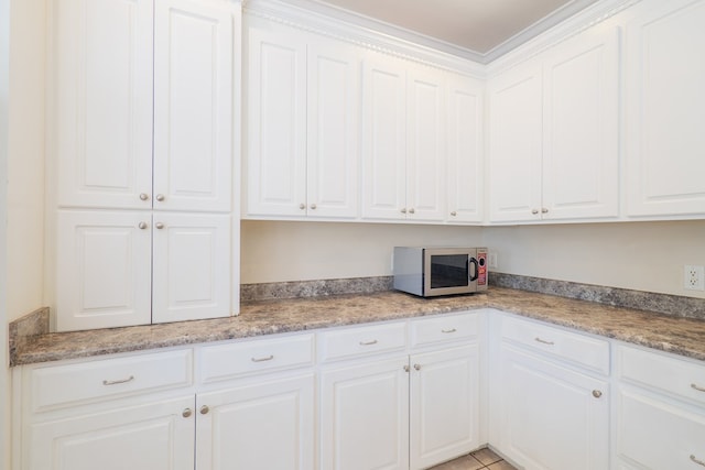 kitchen with white cabinets