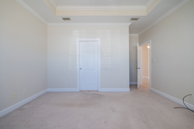 unfurnished bedroom featuring light carpet and crown molding