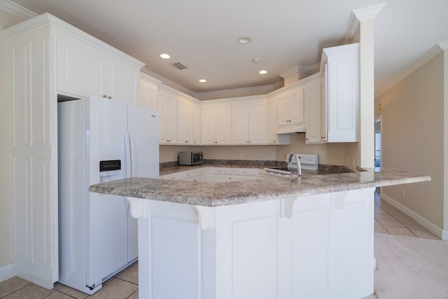 kitchen featuring a breakfast bar, white appliances, kitchen peninsula, ornamental molding, and custom range hood