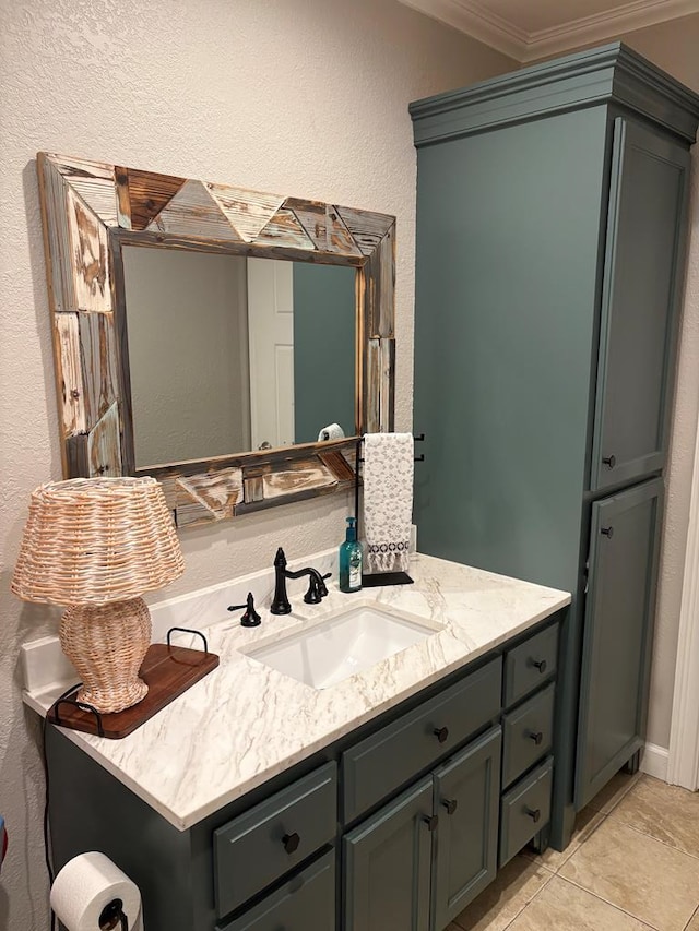 2406 Winding Way, Valdosta, GA 31602 - bathroom featuring ornamental molding, vanity, and a textured wall