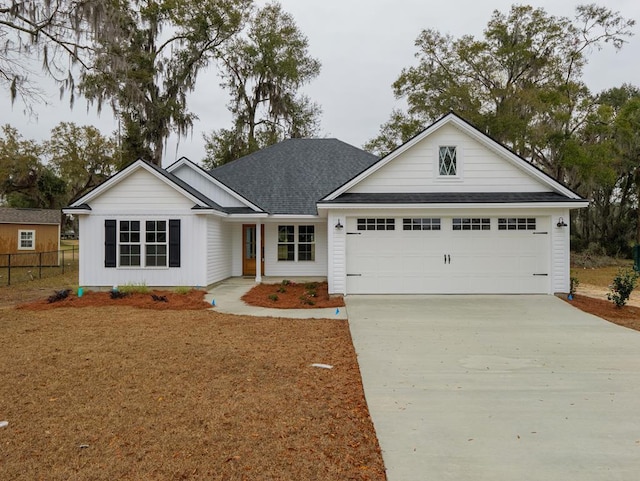 ranch-style house featuring a garage