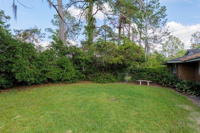 view of yard with fence