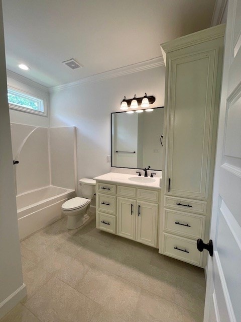 bathroom with crown molding, visible vents, shower / bathing tub combination, toilet, and vanity