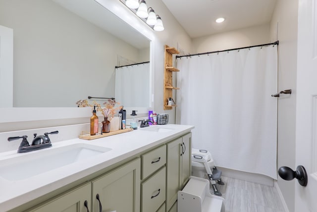 full bathroom featuring a sink, double vanity, and shower / bathtub combination with curtain
