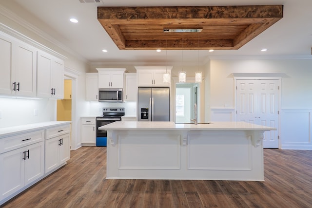 kitchen featuring dark hardwood / wood-style flooring, stainless steel appliances, white cabinetry, and a tray ceiling