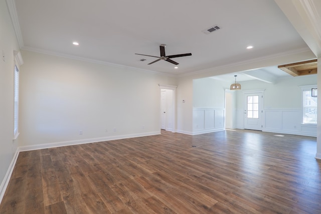 unfurnished living room with beam ceiling, crown molding, ceiling fan, and dark wood-type flooring