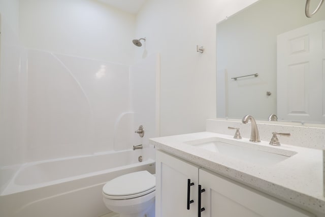 full bathroom with shower / bathing tub combination, vanity, and toilet